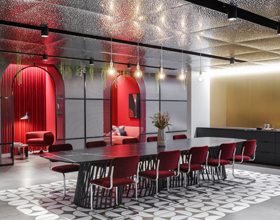 Mirrored Metal Ceiling Energizes Workspace Interior