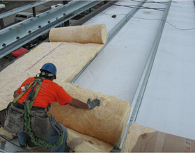 Top 5 Factors: Comparing Insulated Metal Panels vs. Metal Building Insulation