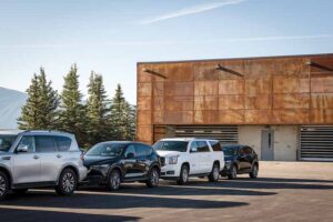 Needs translated into a fuel island, a washing building, and a detailing building. 