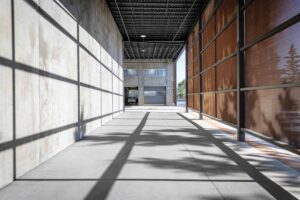 The three program spaces all reside under one large, heroic low-sloped roof.
