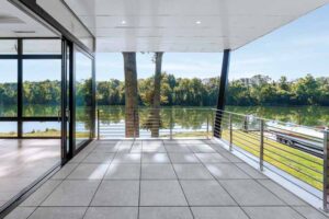 There is a metal railing on the patio deck, and these touches continue inside.