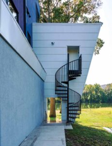 An exterior stair is a common design on new houses along the river.