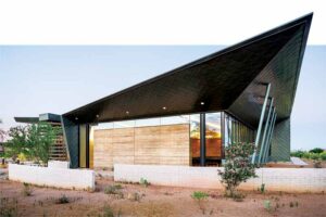 The exterior of the TSG building uses RHEINZINK diamond-shaped zinc tiles.