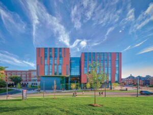 Each window is glazed in a glossy finish to reflect differing lighting conditions as one moves across the facade or drives by the building. 