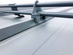 A close up view of the equipment that makes up a snow guard system. 