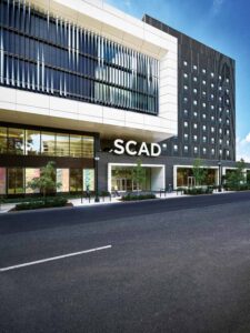 An angled shot showing the SCAD logo at the street entrance, and the sunshades above. 