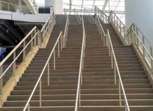 A close up shot of the railings along the staircase inside SoFi Stadium. 
