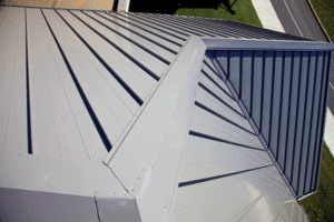 A close up shot of a grey metal roof. 