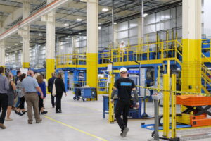 a group of people in a factory