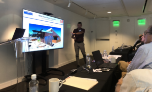 man giving powerpoint presentation