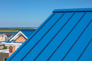 A close-up view of the roof's bright blue metal panels. 