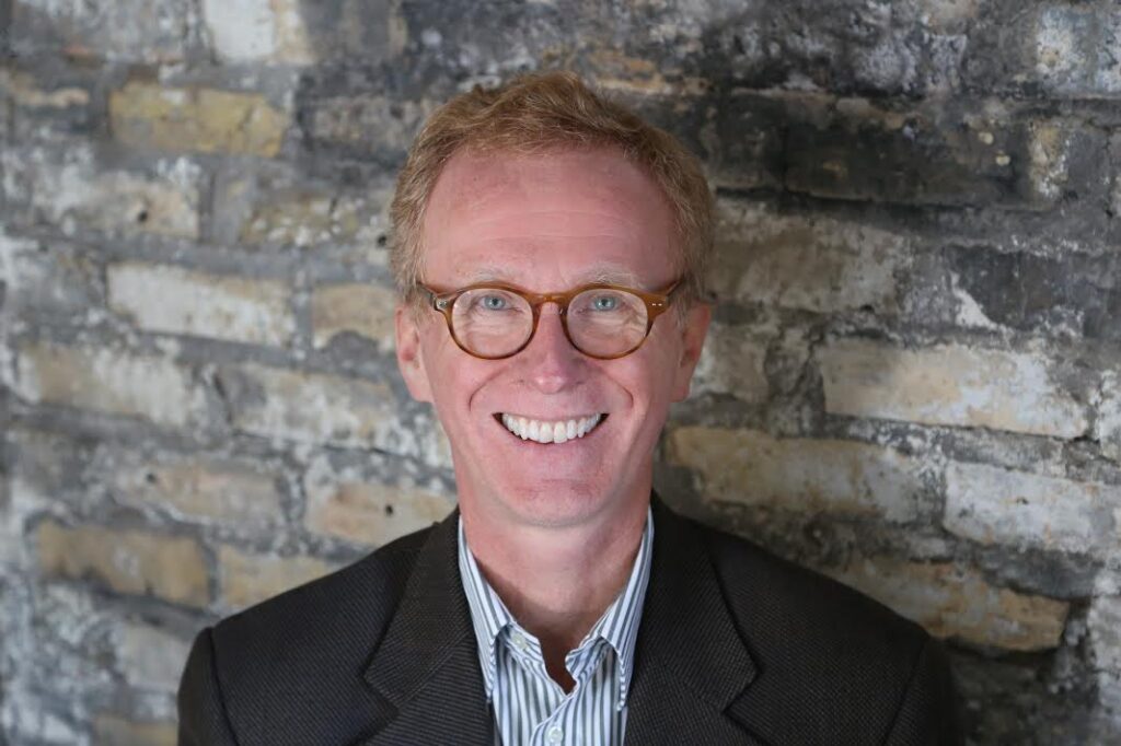 headshot of Thomas Fisher