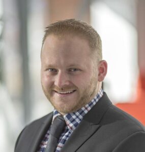 headshot of Christopher Grey