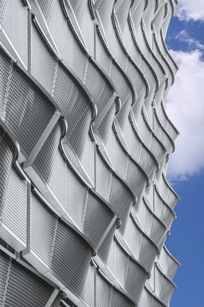 The exterior of a building featuring a proprietary metal plate system.