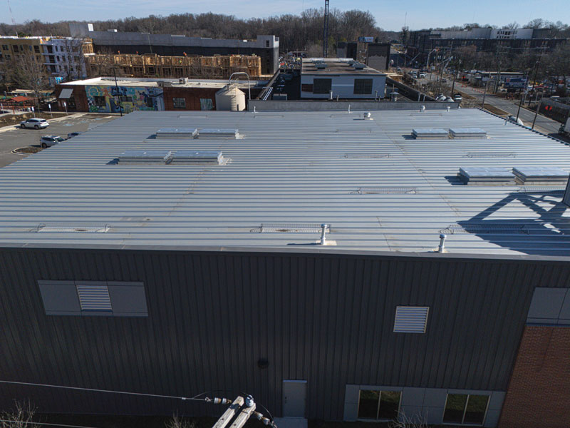 The brewery's flat rooftop featuring metal panels.
