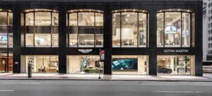 Champagne-frame facade of Aston Martin showroom designed by Alexander Zilberman Architecture.