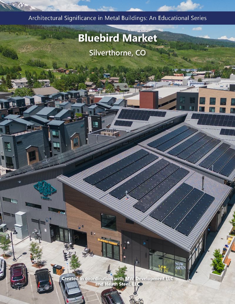 The front cover of an architectural folio displaying a market building with sloped rooved and solar panels with the title, "Bluebird Market," and the subtitle, "Silverthrone, CO."