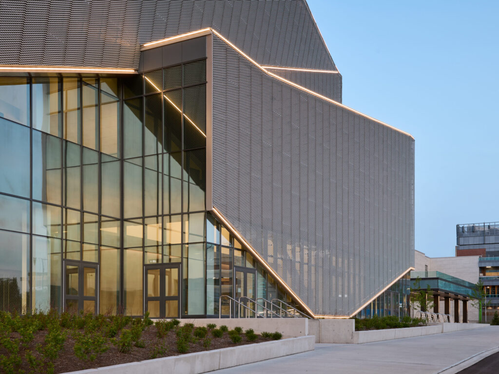 Exterior of geometric modern casino with camera angle close to wall and windows
