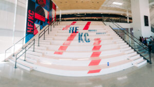 Wide stairs with railing.