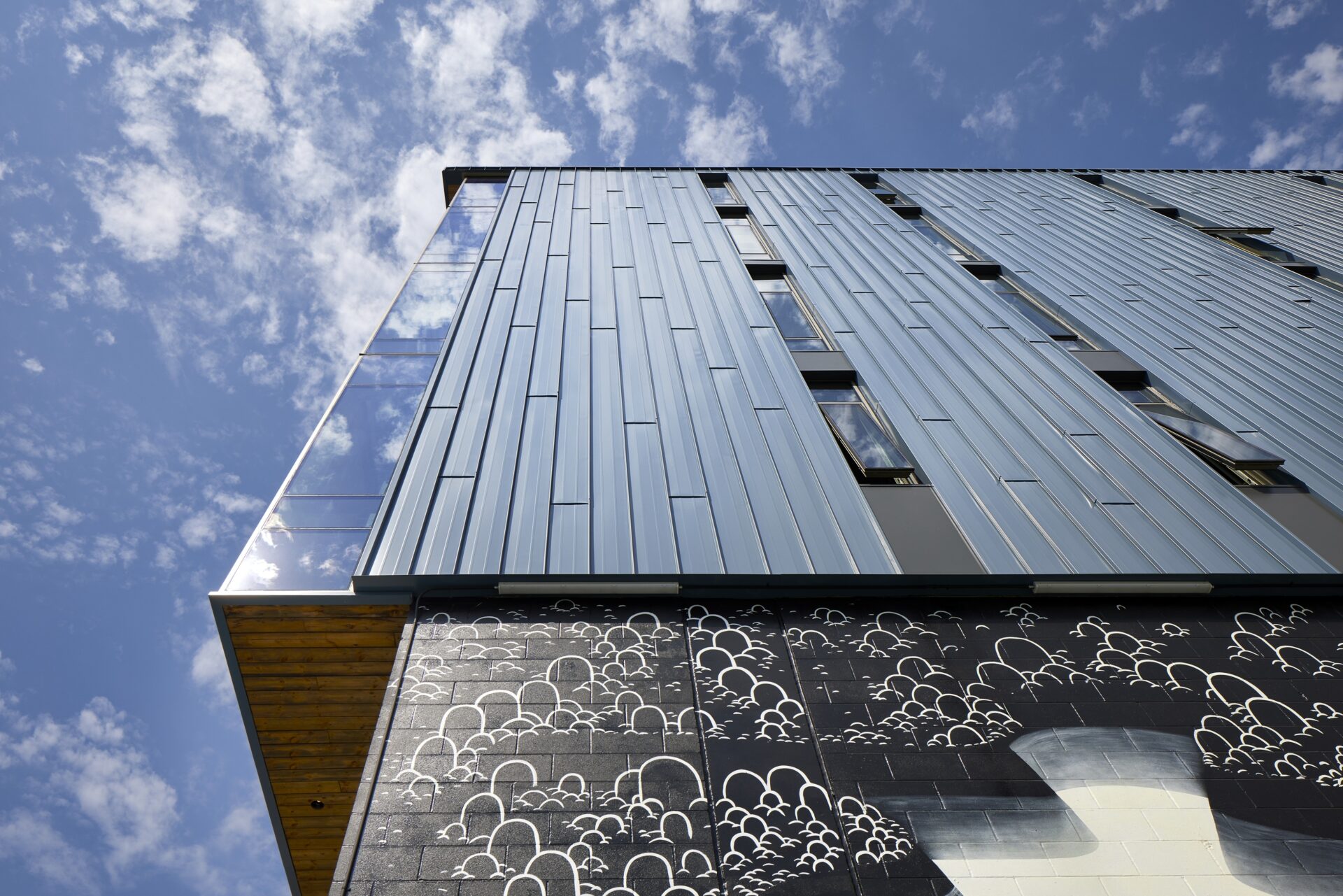 Close-up of building with camera angle directed up the wall.