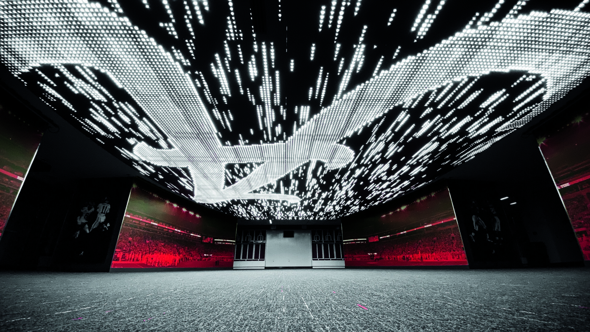 A display of opportunities for Metal Ceilings with metal ceiling reflecting light in football locker room