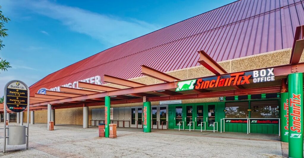 Metal roofing show guards project displayed with distinctive ribbed red metal panel roof