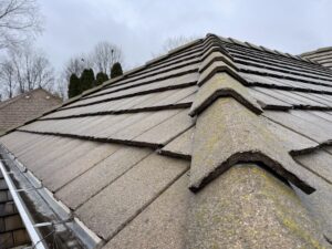 Close-up upward angle camera perspective of the corner of roofing.