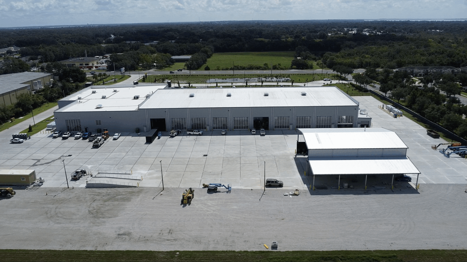Exterior view of large manufacturing structure, exemplifying compliance with Florida building codes.