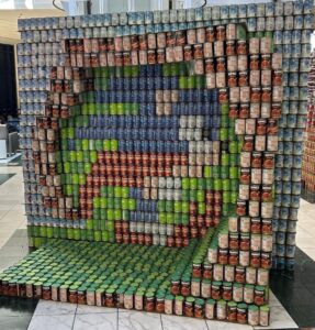 This image features a can sculpture of sonic the hedgehog.