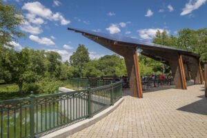 Exterior view of KAI Enterprises' design of canopy, prominently featuring rust-colored Corten steel.