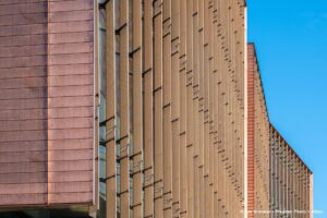 Close up view of metal panels, curtain wall.