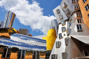 Structure with geometric facade and metal cladding.
