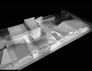 Rendering featuring shades of grey, black, and white in a building display.