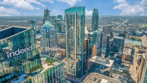 Exterior view of skyscrapers, with prominent skyline in view.