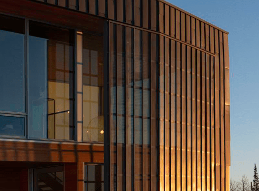 Close-up view of steel panels on building exterior.