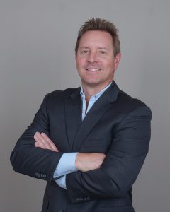 Jacob Johnson in a suit.