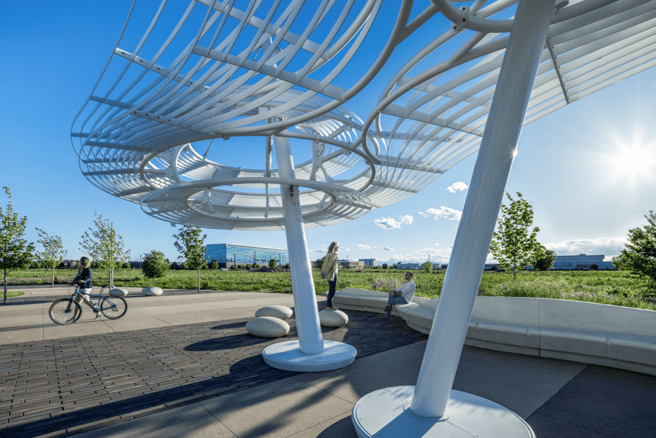 Side view of cloud-like structure with flowerbed in view