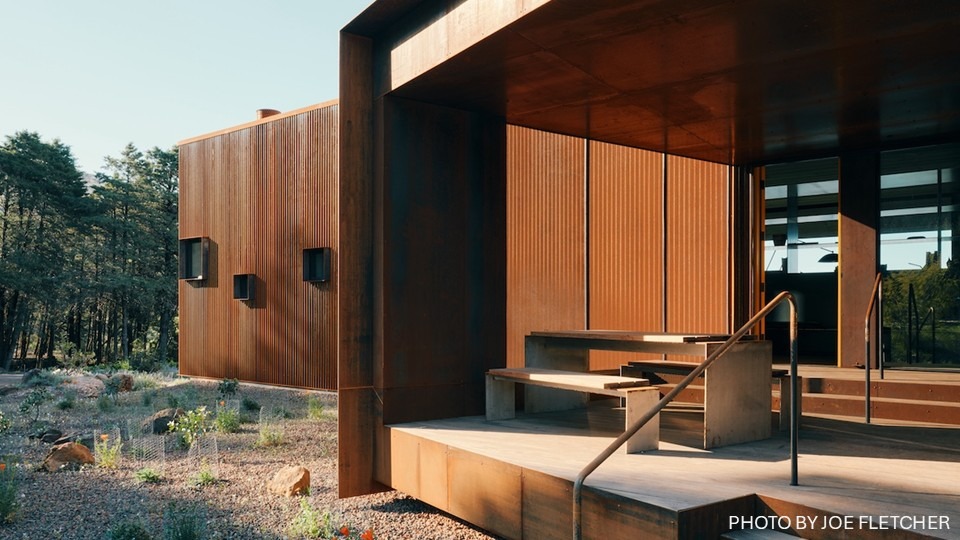 Close-up side view of the pine flat residence