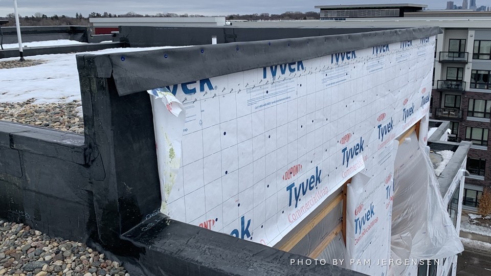 Air barrier on exterior of facade