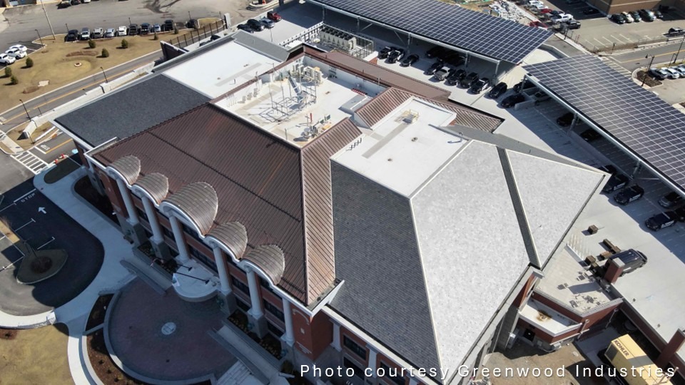 Overhead view of roof with prominent copper accents