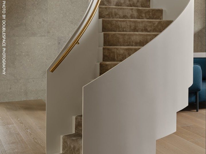 steel stair with white guardrail