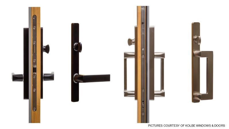 Four Kolbe door handle sets displayed against a white background, including lever and pull styles with dark finishes and contrasting metal accents.